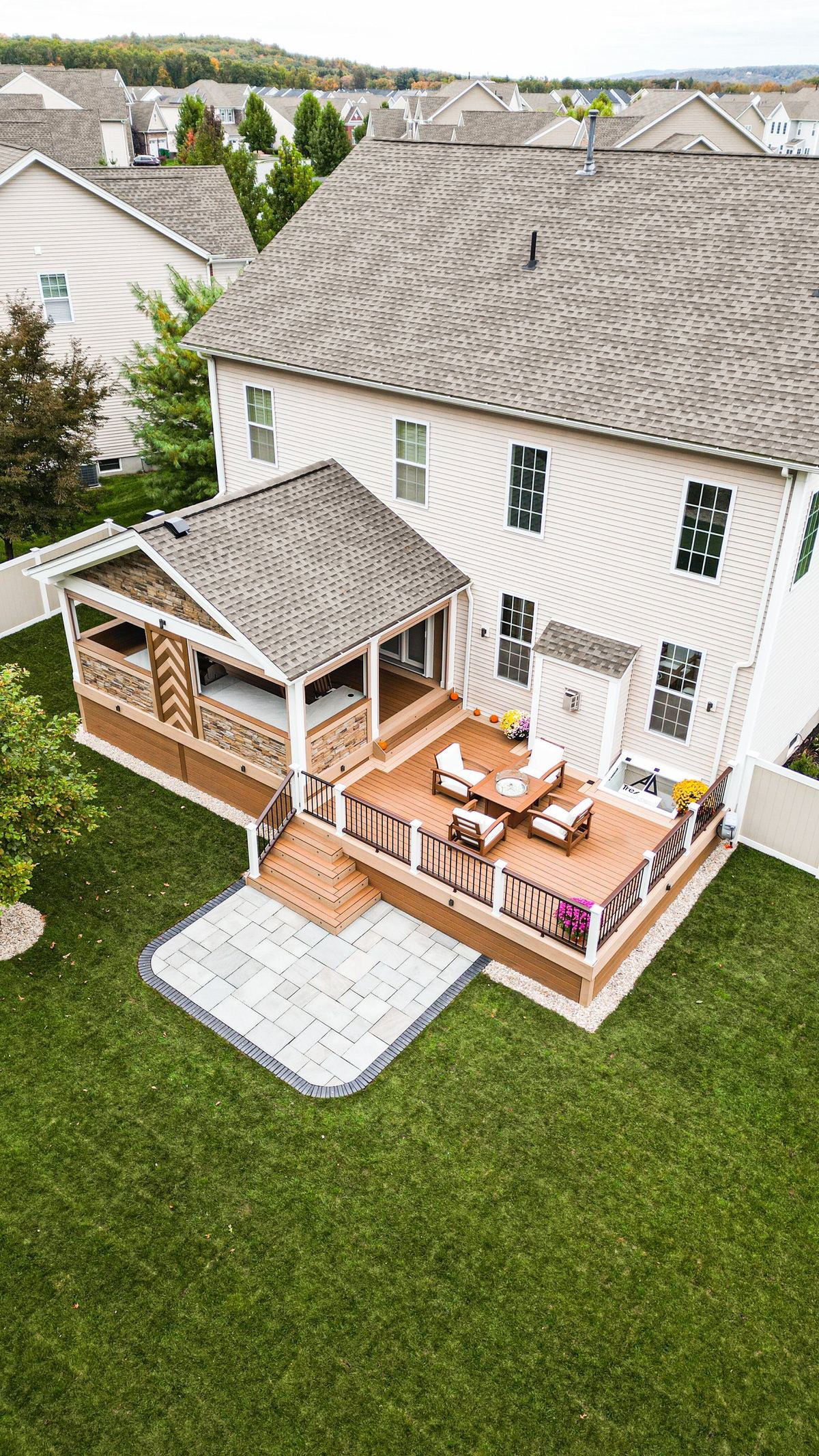 Aerial of a Dutchess County deck and covered porch in fall foliage
