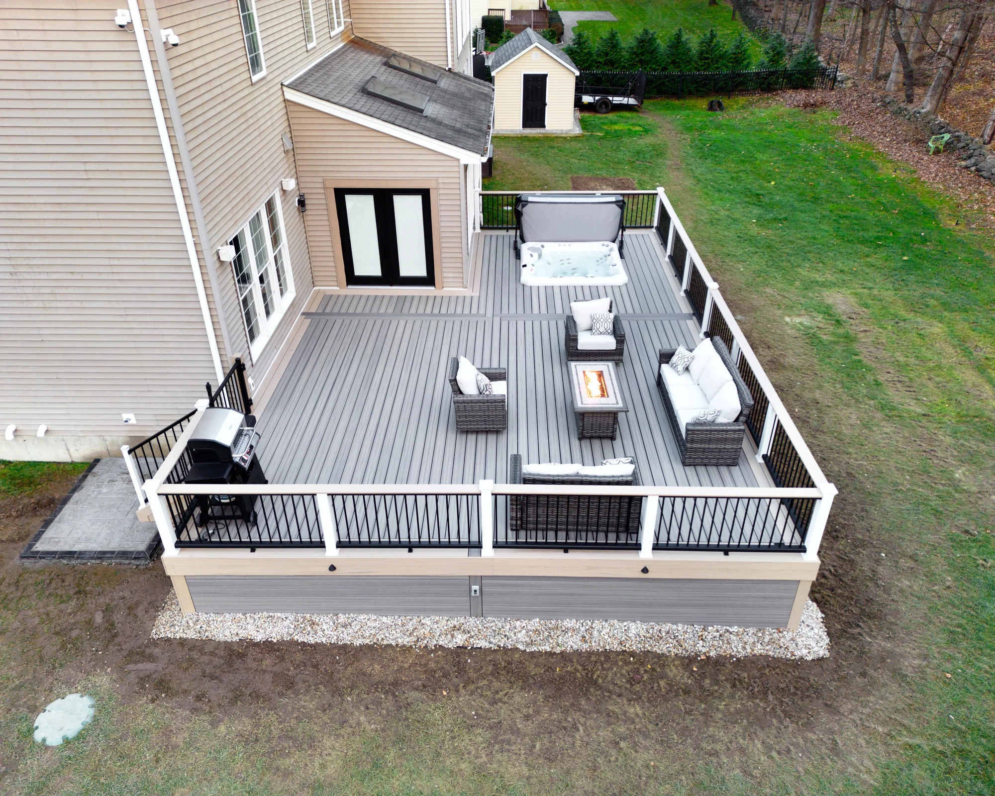 Overhead aerial of a Trex deck with furniture and railing in the Hudson Valley