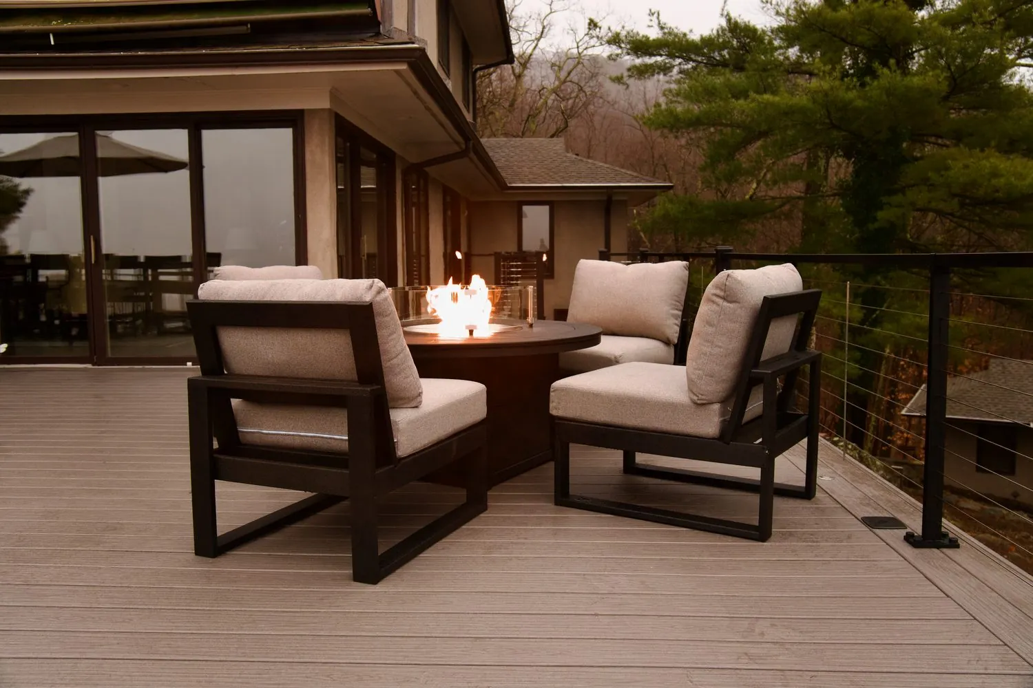 Helical pile supported deck with fire feature over a Putnam hillside