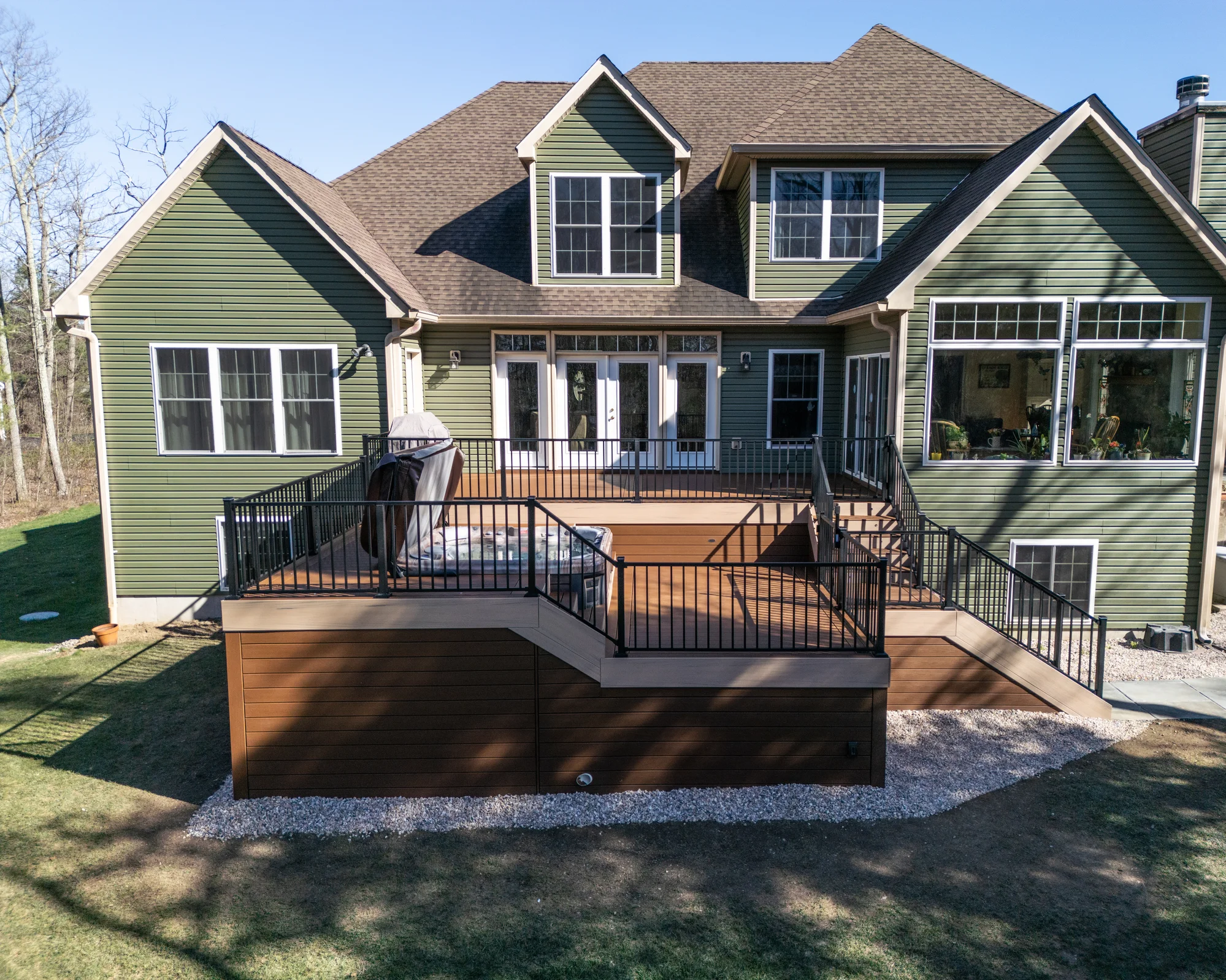 Multi-level hot tub deck with scenic Hudson Valley views